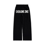 DISTORTED LOGO OVERSIZED BOTTOMS￼